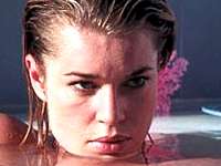 
   REBECCA ROMIJN-STAMOS as   
   Laura Ash / Lilly
   